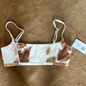 We Wore What Cow Print Sports bra